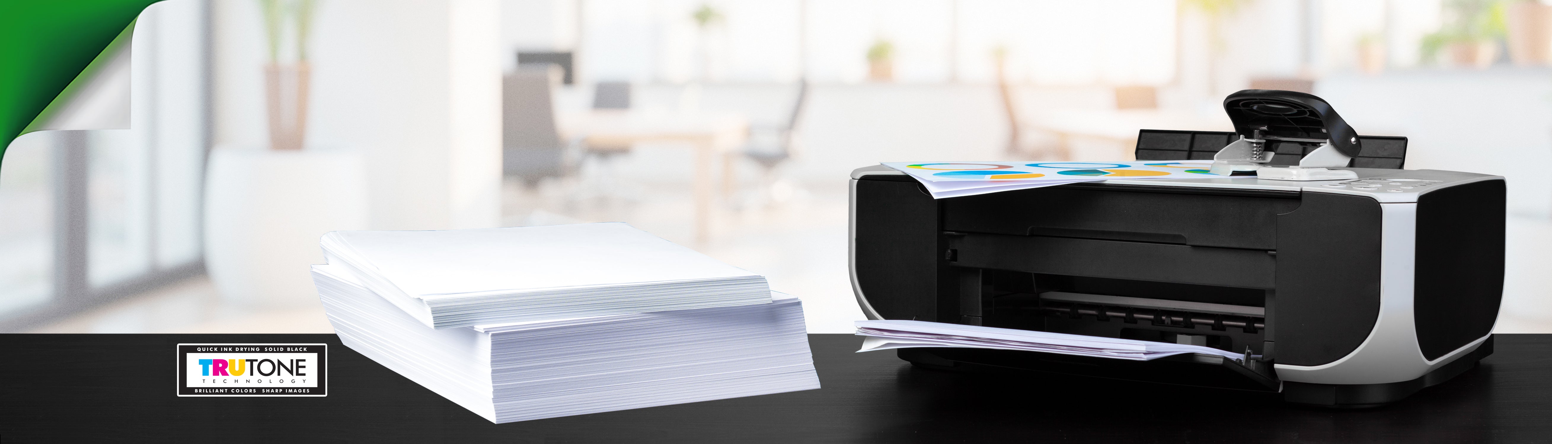 Equipment like printers and copiers in action using PAPERLINE paper.